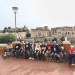 Persones usuàries d'APASA participant a la segona cursa antiracista a Tortosa